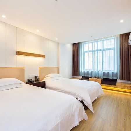 Omeiga Business Hotel Yiwu (Zhejiang) Buitenkant foto
