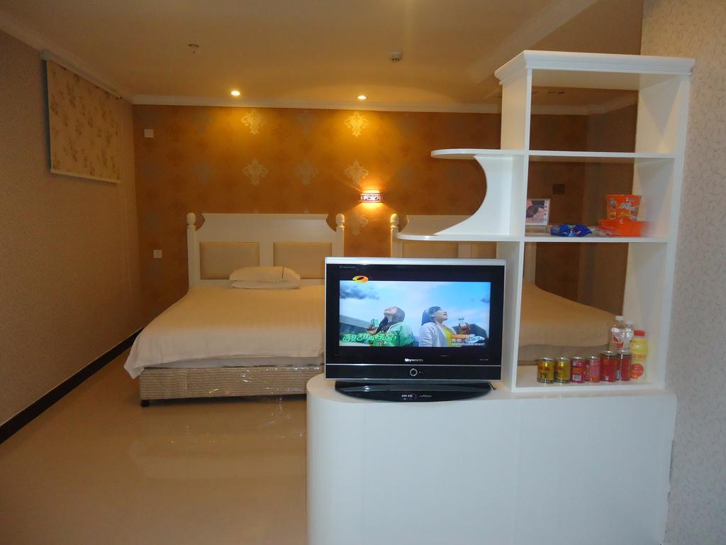 Omeiga Business Hotel Yiwu (Zhejiang) Kamer foto