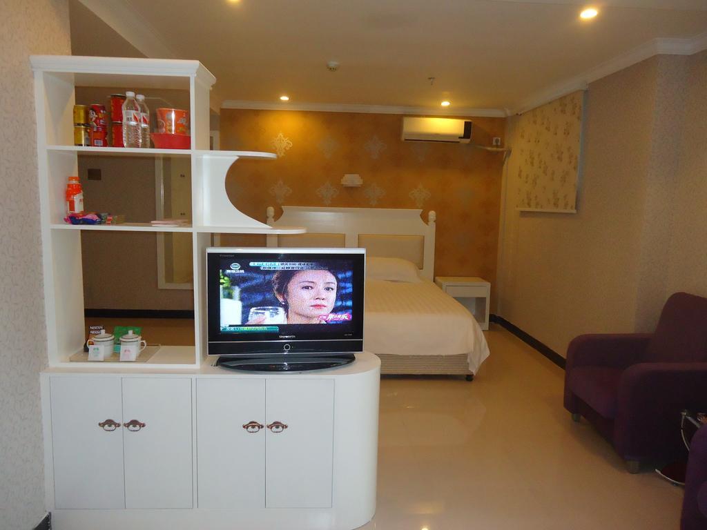Omeiga Business Hotel Yiwu (Zhejiang) Kamer foto