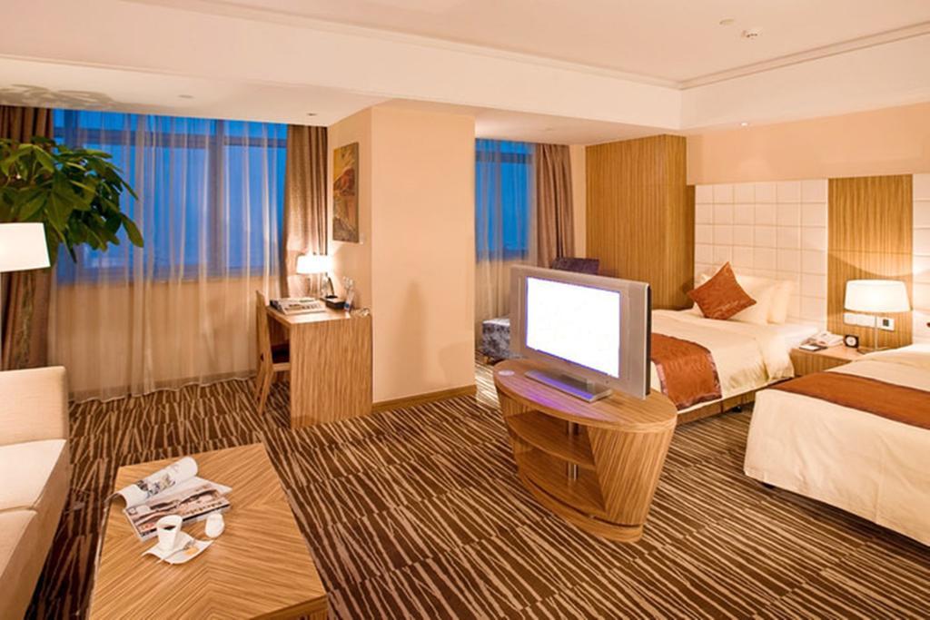 Omeiga Business Hotel Yiwu (Zhejiang) Kamer foto