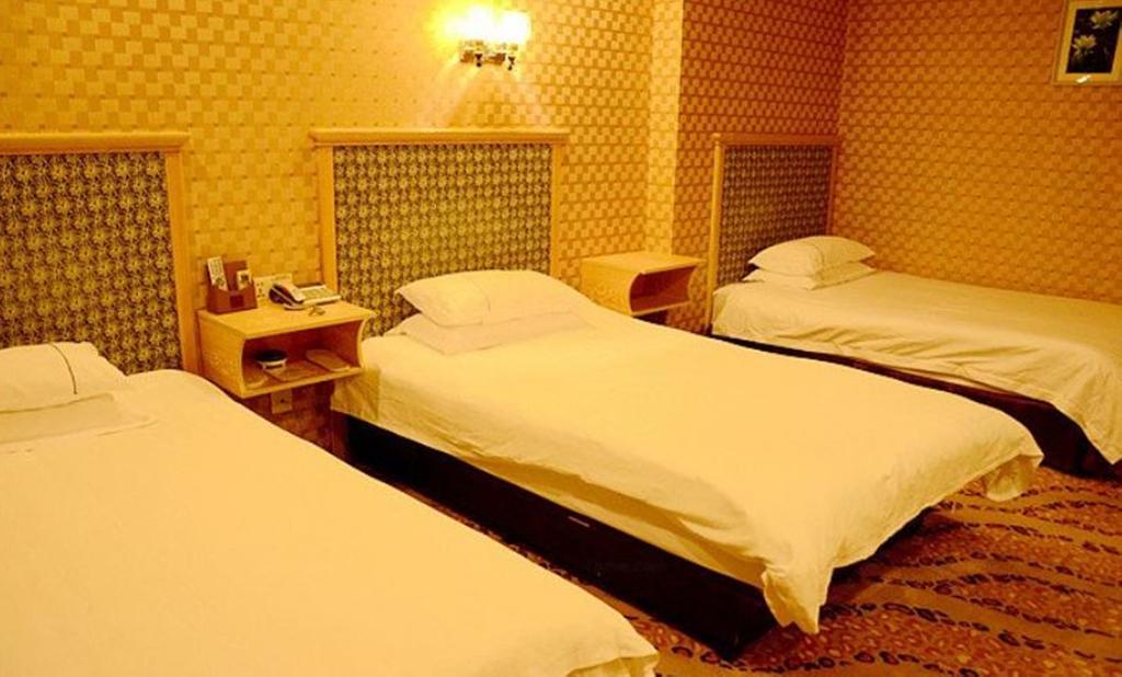 Omeiga Business Hotel Yiwu (Zhejiang) Kamer foto