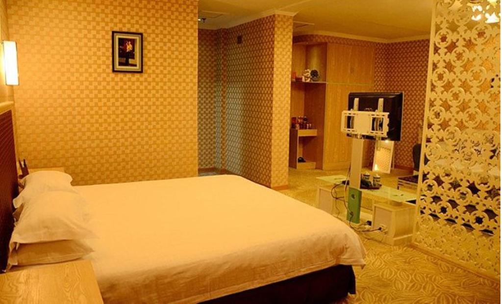 Omeiga Business Hotel Yiwu (Zhejiang) Kamer foto