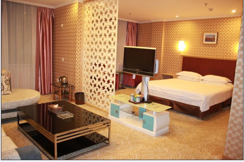 Omeiga Business Hotel Yiwu (Zhejiang) Kamer foto