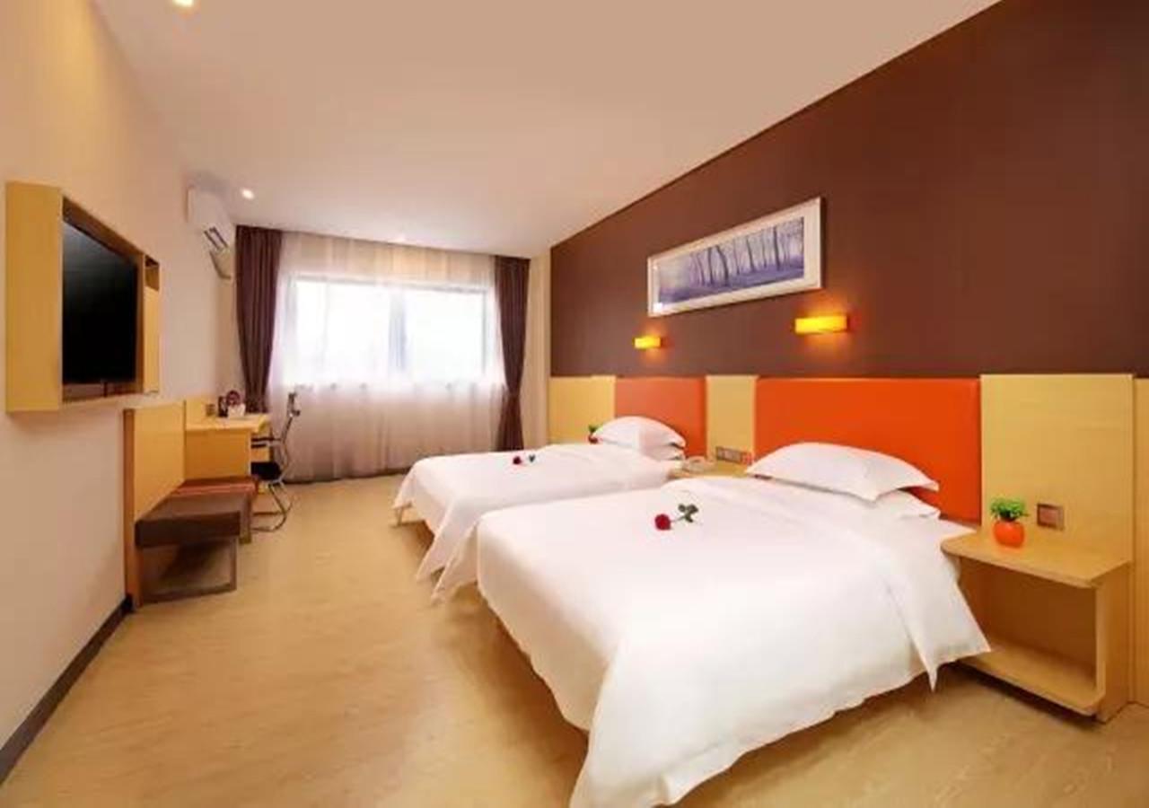 Omeiga Business Hotel Yiwu (Zhejiang) Buitenkant foto